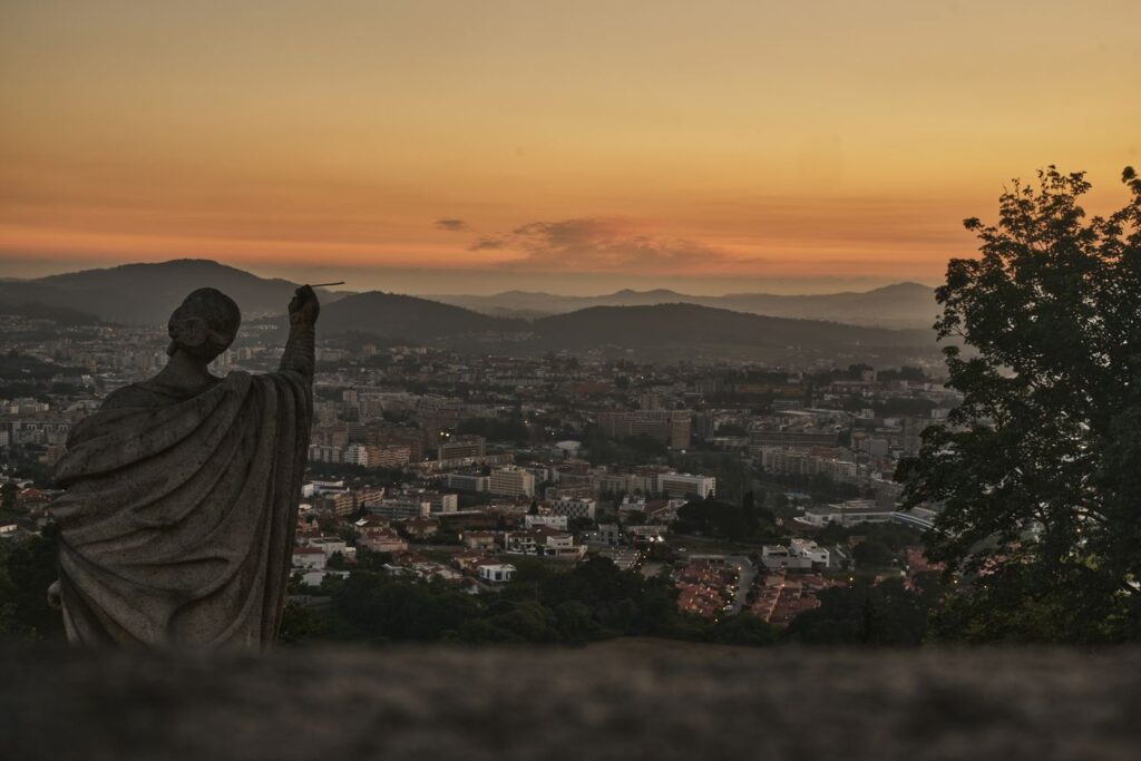 Stunning view of Braga from Bom Jesus do Monte with city skyline at sunset.